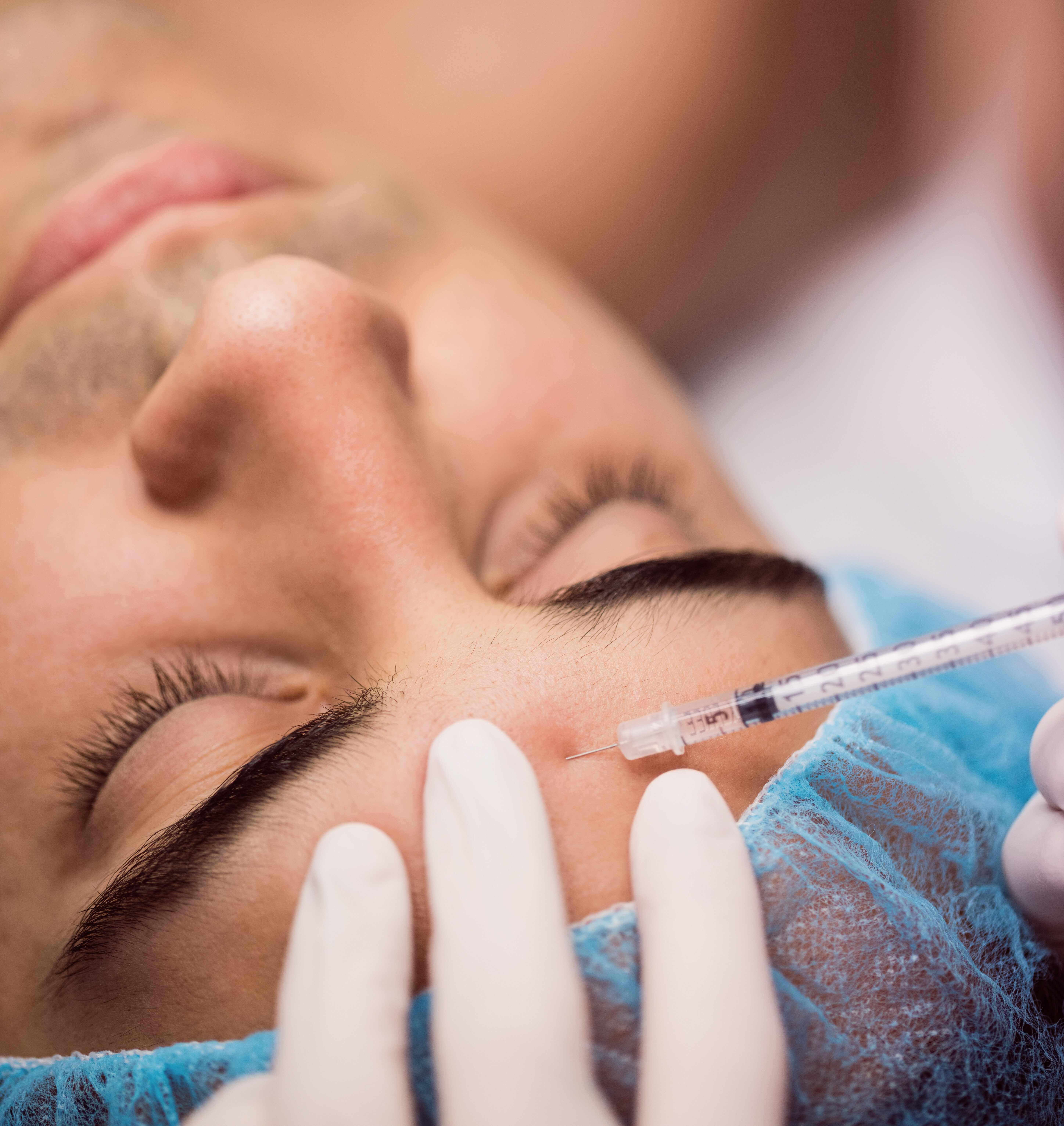 Paitent receiving Botox Injection to the forehead